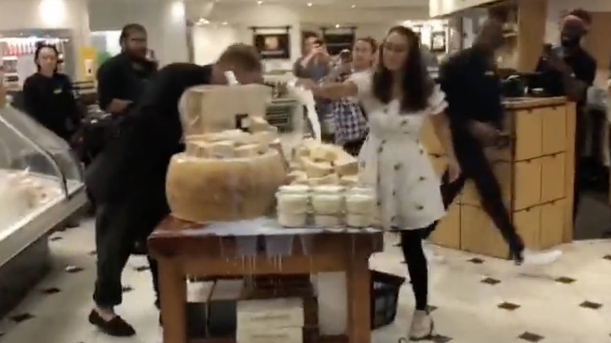 'Parmesan-hating' protesters pour milk over cheese display in ...
