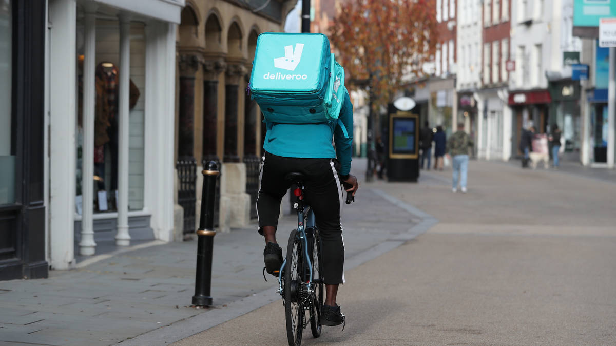 Deliveroo posts £245m loss after takeaway orders slowed in 2022 | LBC
