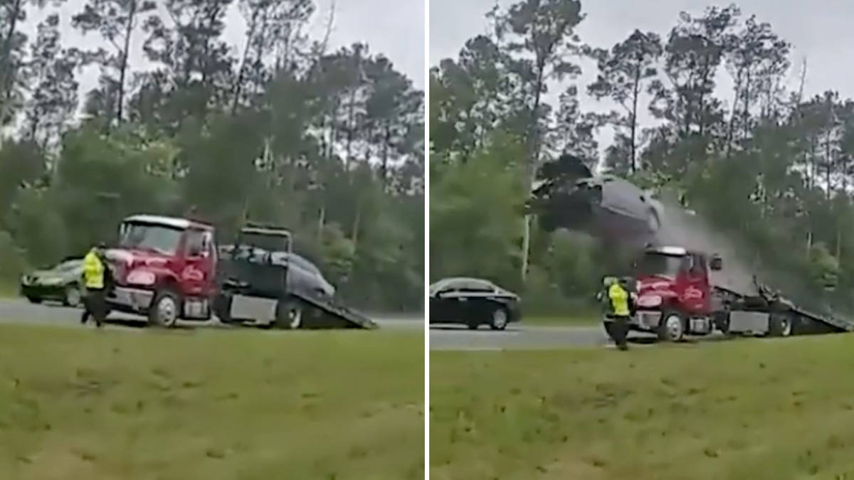 Shocking moment driver hits tow truck ramp at full speed, launches ...