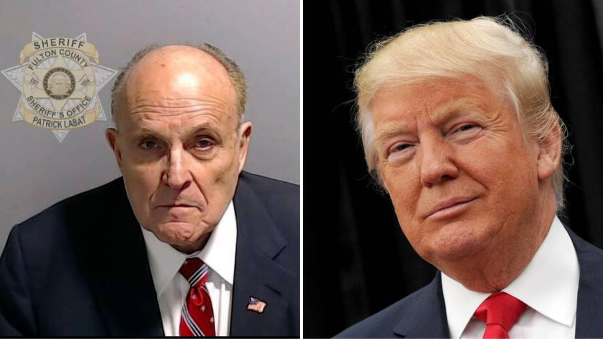 Rudy Giuliani hands himself in to police over claims he helped Donald ...