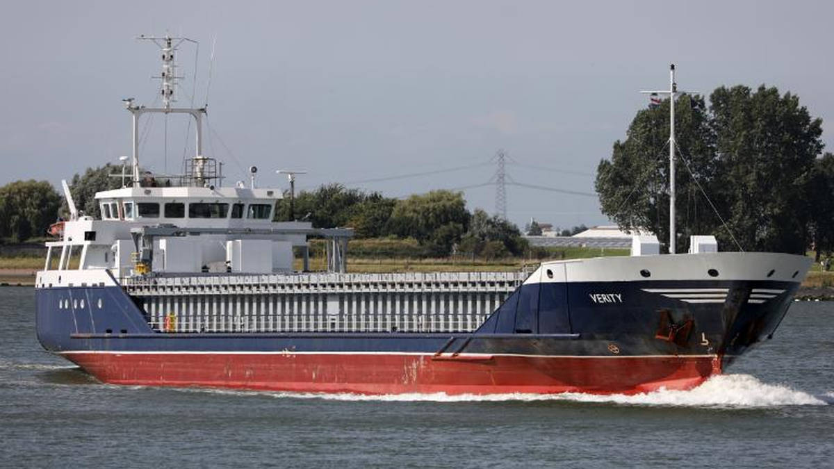 British cargo ship sinks after collision in the North Sea with one man found dead in sea, as search continues