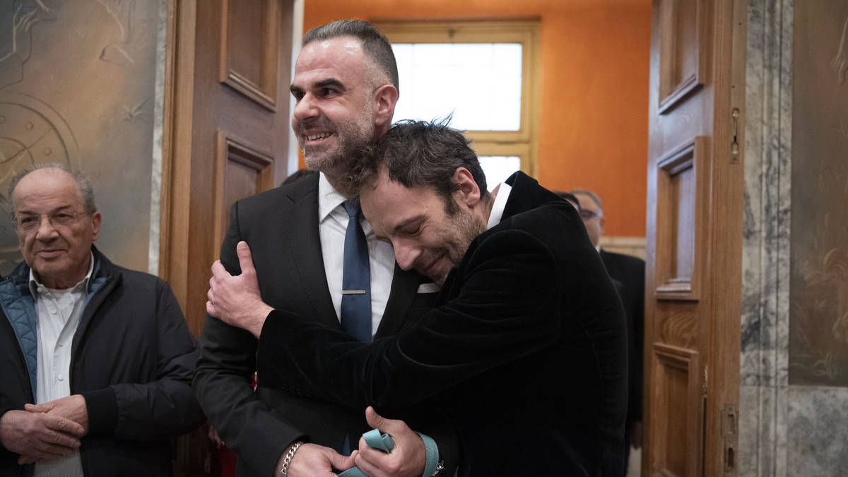 Greek novelist and lawyer are first same-sex couple to wed at Athens city hall