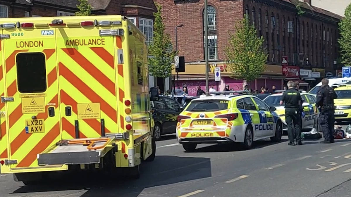 Man, 22, charged with murder after woman in her 60s stabbed to death in ...