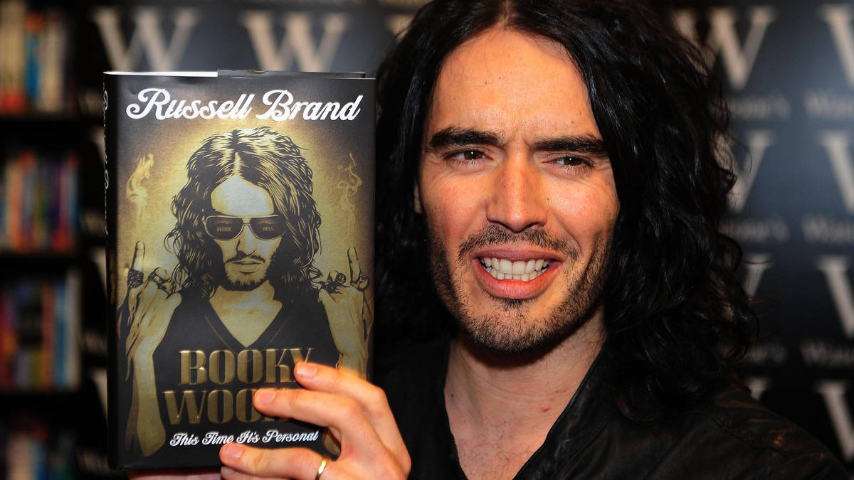 Russell Brand sued for £220,000 by publisher over failure to write two ...