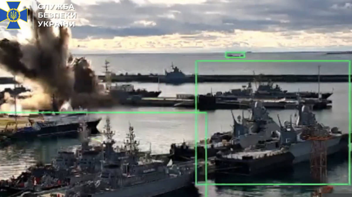 Moment Ukraine's underwater drones strike £300m Russian submarine in 'first-of-its kind' attack