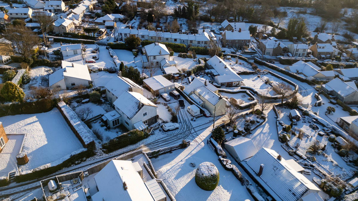 Snow and ice warnings upgraded as arctic blast grips UK on first ...
