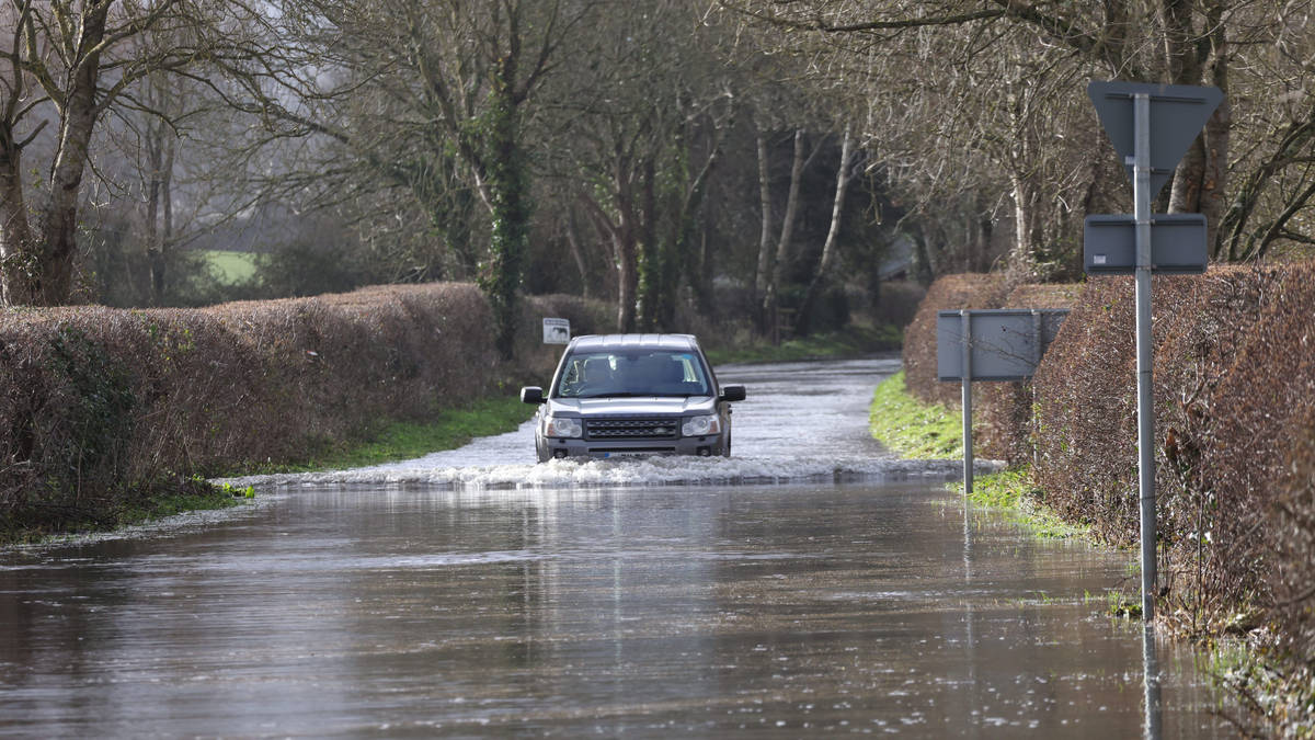 Yellow weather warnings in place as heavy rain triggers further flooding across UK in wake of Storm Chandra