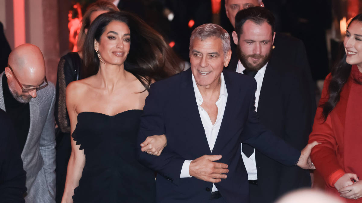 George and Amal Clooney bring their signature style to Milan during the ...