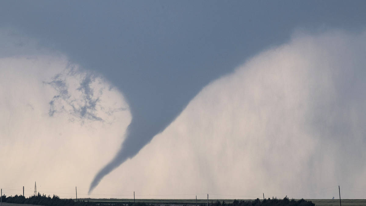 At least four dead as tornadoes and powerful storms rip through ...