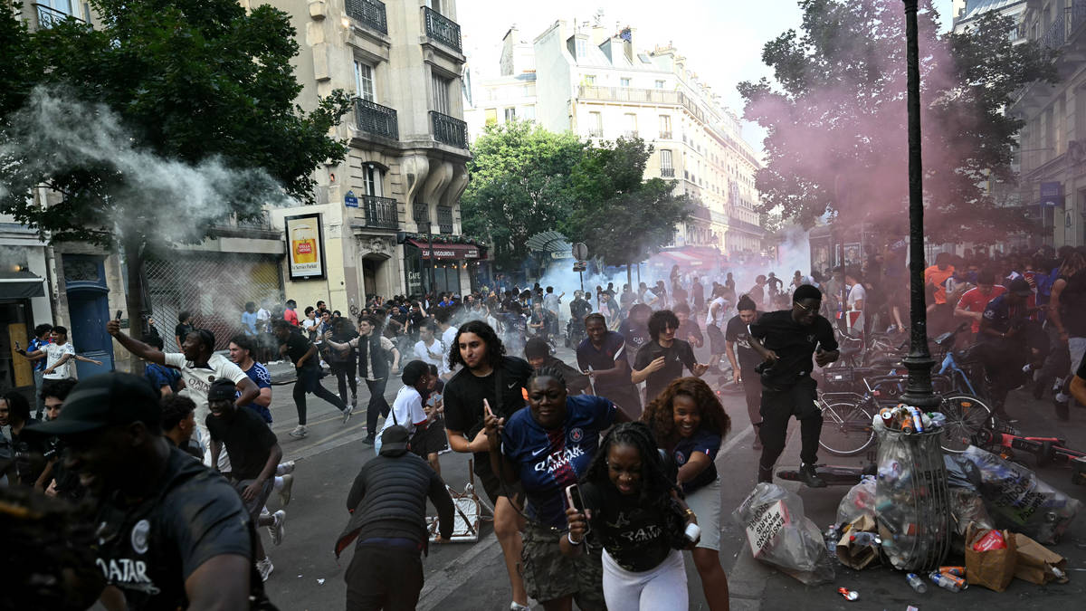 One dead, another in intensive care and nearly 800 arrested as riots break out across France after Champions League final