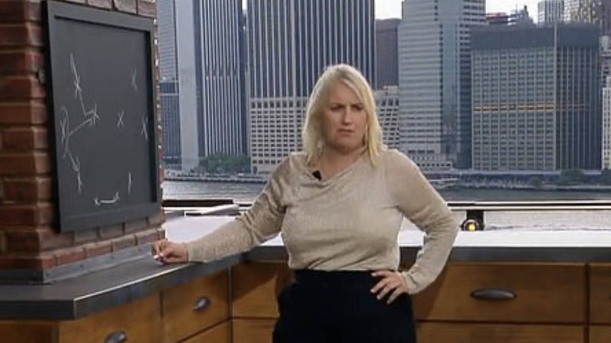 World Cup sexism storm as female pundit Emma Hayes does her tactical analysis from a 'kitchen' with blackboard