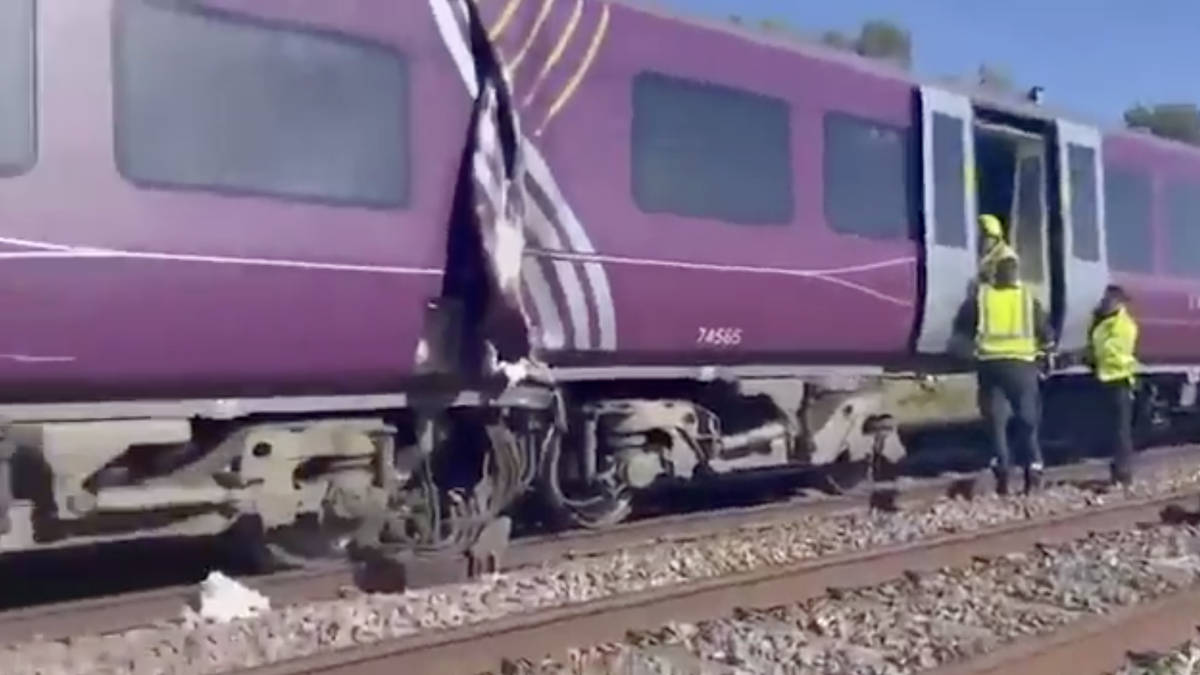 One dead in horror train crash between two rush hour services - with several more seriously injured