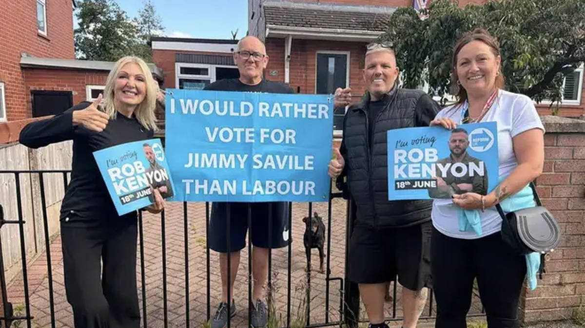 Reform councillor who posed with sign saying 'I would rather vote for Jimmy Savile than vote for Labour' apologises