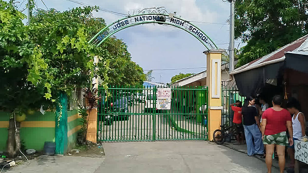Three people dead and seven injured after teens open fire at a school in the Philippines