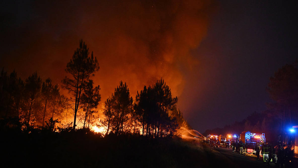 Two firefighters die in Crete as EU agency warns all of the continent could be on fire 'within days' amid surging wildfires