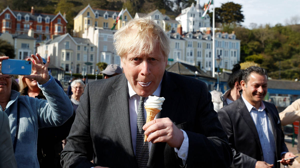 What do UK politicians do during the summer, when is Parliament back, and where do Prime Ministers go on holiday?