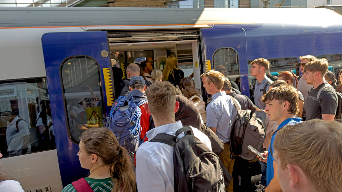 Train passengers urged to 'only travel if necessary' as temperatures soar