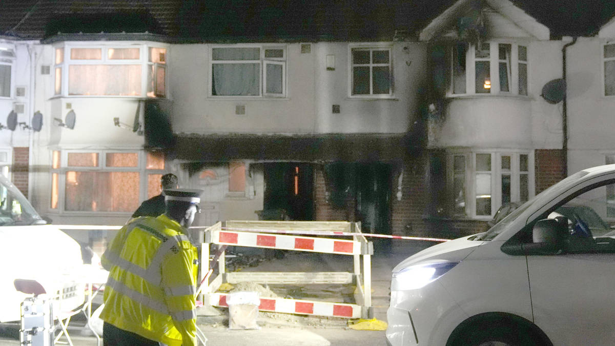 Man, 34, arrested on suspicion of murder after west London house fire leaves one woman dead and another critical