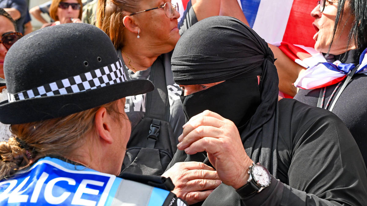Man, 76, charged with concealing identity after 'wearing a burkha' at Portsmouth anti-migrant protest