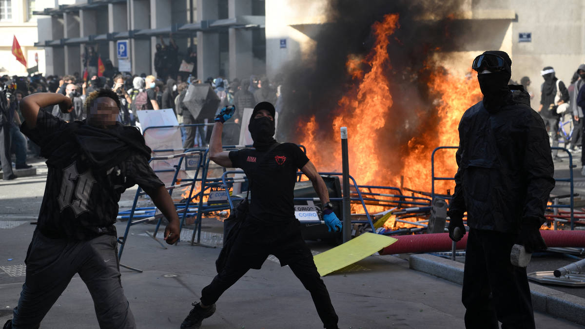 French riot police fire tear gas as more than 250,000 rally for school funding
