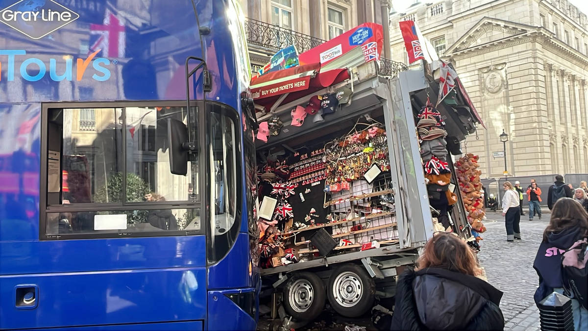 Tour bus hits souvenir stand near Trafalgar Square