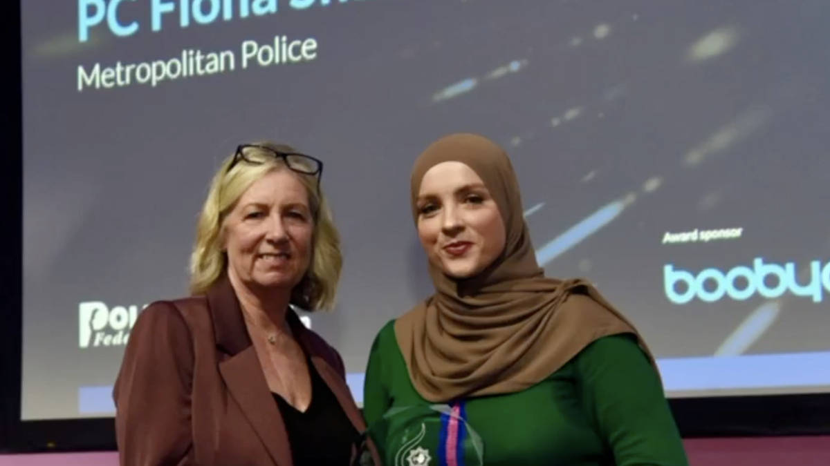 Met police chief condemns 'hateful bigots' who directed abuse at award-winning Muslim police officer who was pictured with gun
